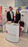 Commodatio employees presenting Alpen Pharma products during the symposium on intestinal microbiota