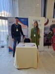 Commodatio employees presenting Adexilis Adria products during the symposium on intestinal microbiota